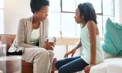 A woman and young teen have a discussion