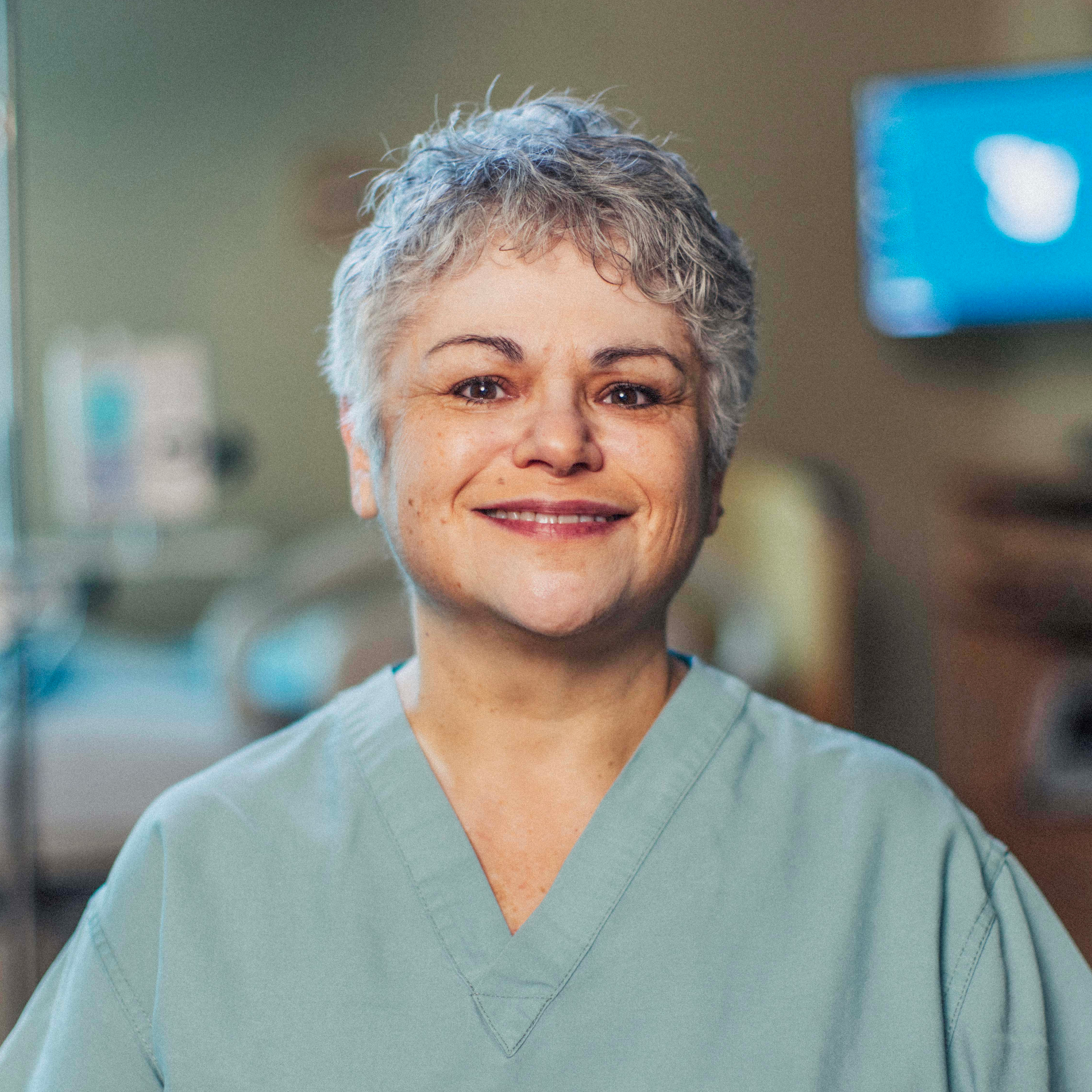 Sarah Moore, RN, labor and delivery nurse, smiles for the camera