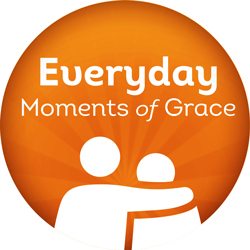 Everyday moments of grace icon features an orange circle background with 2 person silhouettes in a comforting embrace