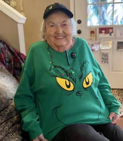 Photo of Vine Tyler in a grinch sweater