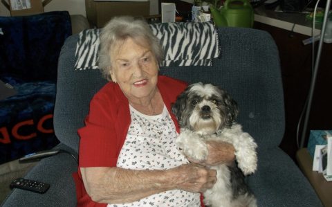 Photo of Vine Tyler with a dog