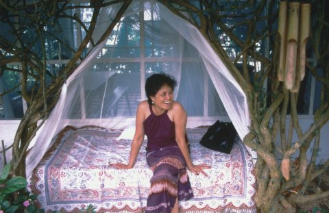 Cynthia looking away and smiling