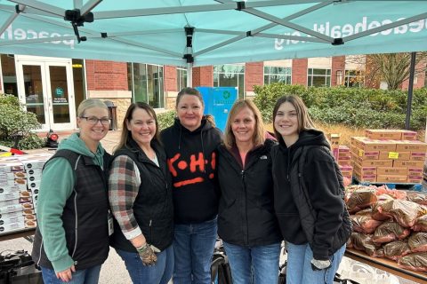 Thanksgiving basket committee - five women smiling at the camera