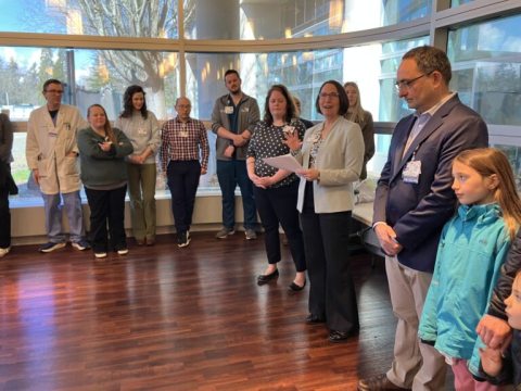 Dr. Gober introduces the winner of the 2026 TouchStone Award, Alejandro Rey, MD.