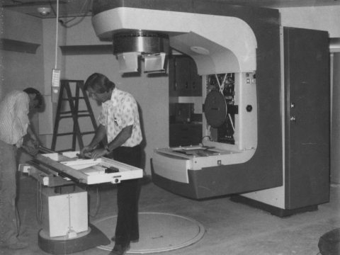Dr. James Douglas at installation of new linear accelerator in Radiation 
