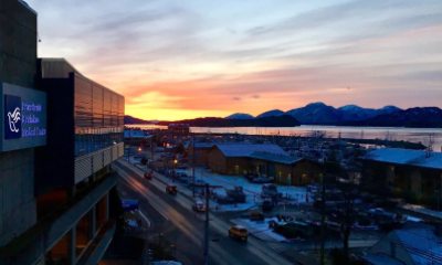 A view of the sunset and water reflecting off of the PeaceHealth Ketchikan Medical Center