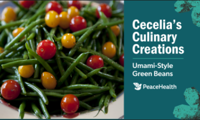 Close-up of dish of green beans and cherry tomatoes