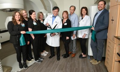 PeaceHealth St. John Medical Team cutting ribbon on new True Beam linear accelerator
