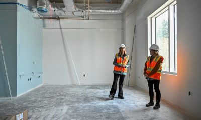 Alicia Beymer, chief administrative officer at RiverBend hospital (left) and Ashley McDonald, CEO of PeaceHealth's new inpatient rehabilitation facility, describe construction status, goals and plans for the new facility