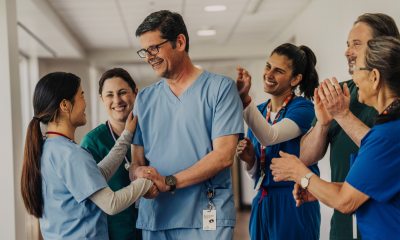 caregivers smiling at each other