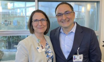 PeaceHealth St. Joseph Medical Center's Chief Medical Officer, Lorna Gober, MD, with the 2026 TouchStone Award winner, Alejandro Rey, MD.