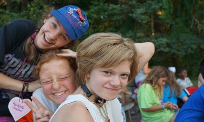 3 courageous kids smiling at the camera