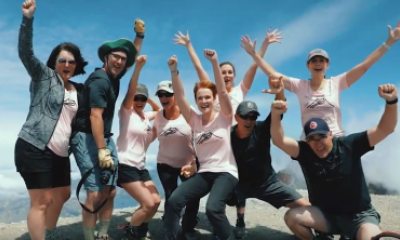 Lisa Boswell and her hiking crew celebrate on top of Mount St. Helen
