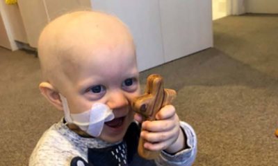 Chaplain's special cross delights New Zealand toddler