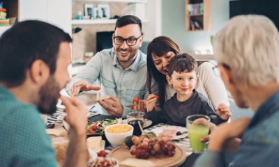 Family eats meal at table