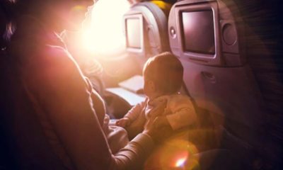 Mom with young baby on an airplane