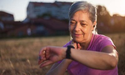older woman checking her heart rate
