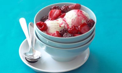bowl of berries over ice milk