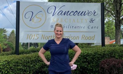 Stacie Jesser in front of Vancouver Specialty and Rehabilitative Care