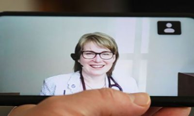 Female doctor shown during a medical appointment via video visit