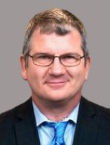 portrait of Adam S. Wilson MD