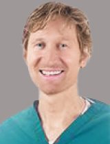 portrait of Joshua G. Schkrohowsky MD