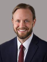 portrait of Anthony A. Holmes MD