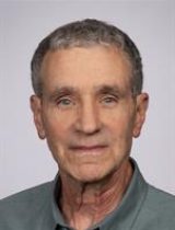 portrait of Clifford J. Schostal MD