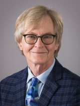 portrait of Michael E. Brage MD