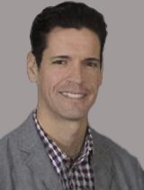 portrait of Erik W. Young MD