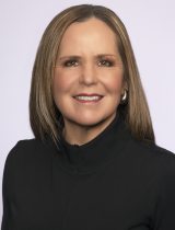 Portrait of Anne Rasmussen in front of white background