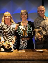 Group photo of Mission & Value Award Winners with their awards