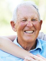 older man and young woman caregiver