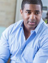 Two people talking in a patient room