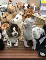 Donated stuffed animals sit on a table at a Vancouver PeaceHealth Pharmacy location
