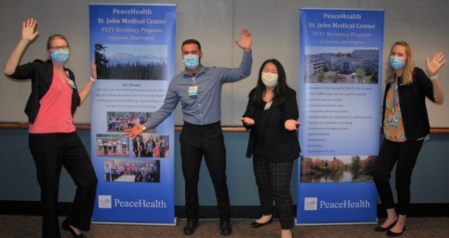 Pharmacy residents at St. John Medical Center display clinical experience information