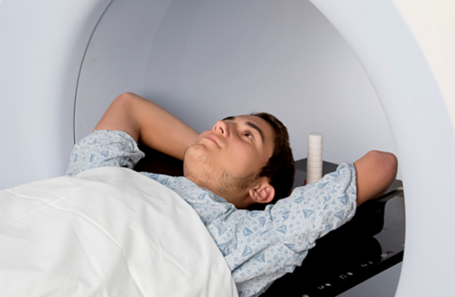 Caregiver calms teen’s MRI fears