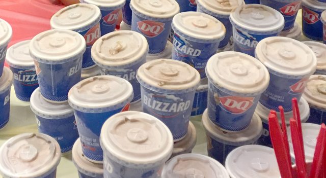 close up of a dozen stacked mini Blizzard frozen treats
