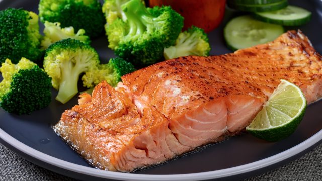 close-up of cooked salmon and broccoli