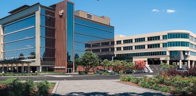 Wide-angle exterior photo of new pavilion at St. Joseph Medical Center