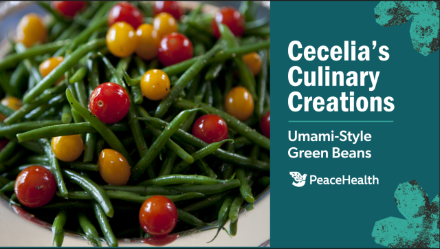 Close-up of dish of green beans and cherry tomatoes