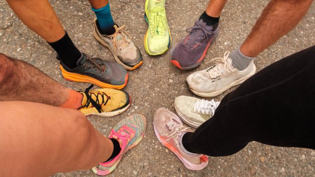 9 feet in running shoes form circle  
