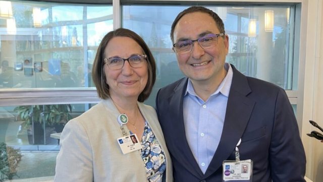 PeaceHealth St. Joseph Medical Center's Chief Medical Officer, Lorna Gober, MD, with the 2026 TouchStone Award winner, Alejandro Rey, MD.