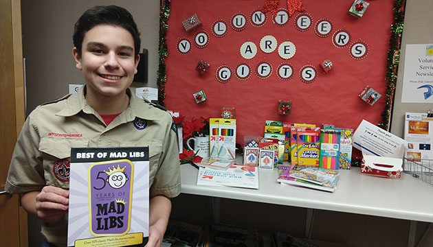 Zach Godoy shows off items for activity cart