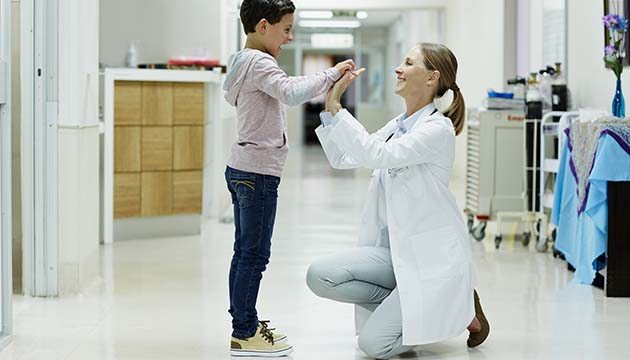 provider helps young patient feel better